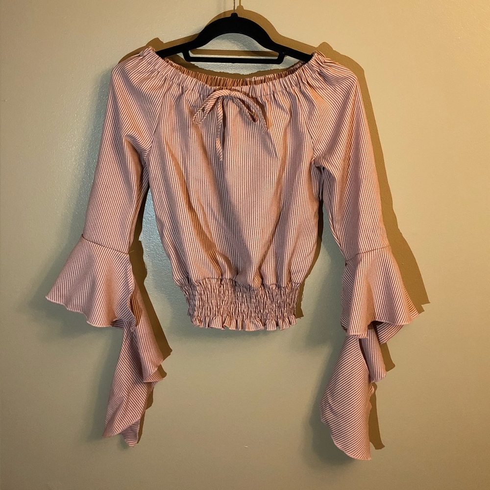 Stripped salmon top with flowing sleeves.